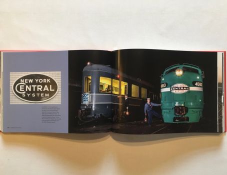 In these colour photographs by Mitch Goldman from the book Logomotive, an EMD E8 locomotive painted Century Green and a two-tone grey passenger car of the famous 20th Century Limited recall the glory days of the New York Central Railroad, identified on a white tiled wall by its 1935 logo.