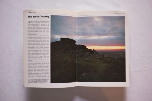 A double-page spread photograph, taken from a west country tor, accompanies an anecdote about the region.