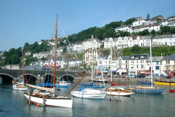 A photograph of Looe harbour and bridge.