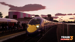 In this colour screenshot, HS1 approaches a platform in dusky light. The patchy clouds create a dramatic skyline.