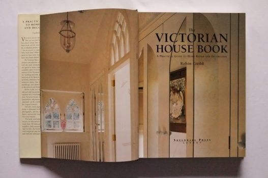 A double-page colour photograph taken by James Mortimer forms the frontispiece of The Victorian House Book, showing off the first-floor landing of a Victorian Gothic house renovated and decorated for a client by the interior designer Robin Guild.