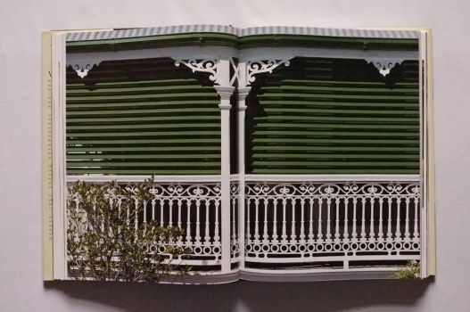 In a picture essay on Decorative Ironwork, on pages 94-94 of The Victorian House Book by Robin Guild, the white ironwork of a balcony contrasts with the green of Venetian blinds to form a sophisticated composition running across a double-page spread.